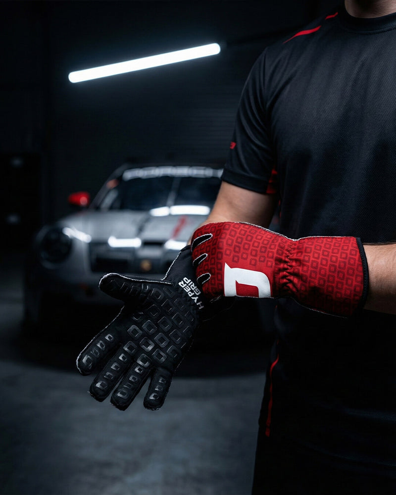 HyperGrip Scuderia sim racing gloves with black palm grip and gt3 car in background studio
