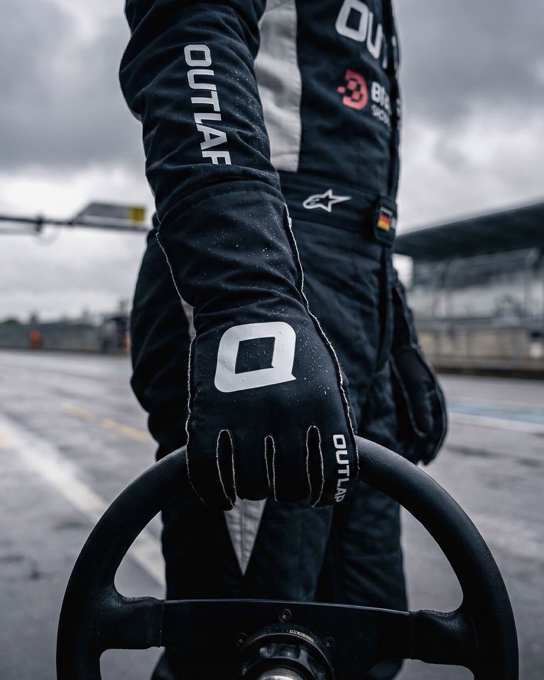 Outlap ProGrip Black Sim Racing Gloves track day gloves holding wheel