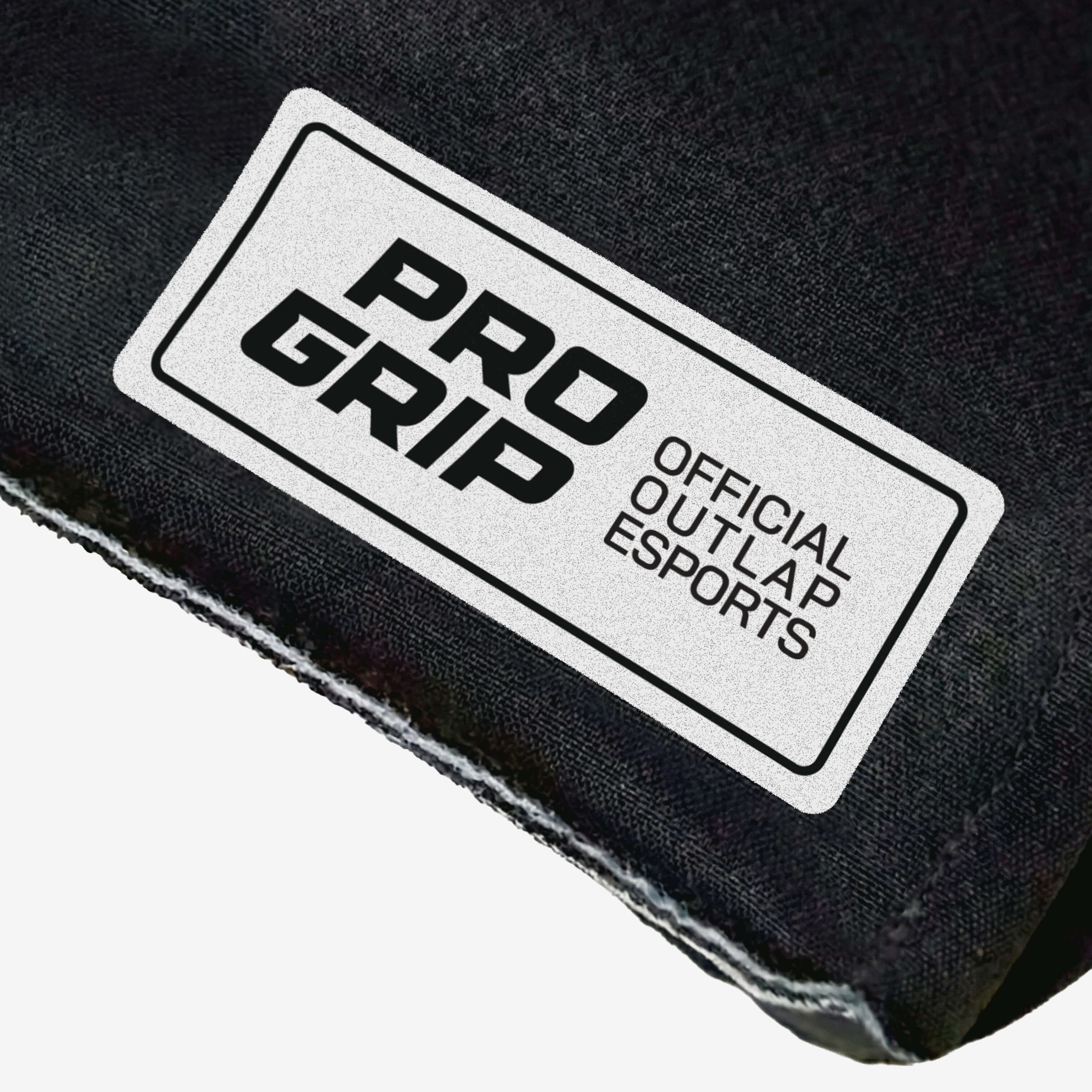 ProGrip gloves sleeve and 'Official Outlap Esports' label on a white background